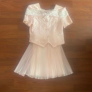 A very beautiful suit for a girl. Guipure blouse, ruffled skirt.